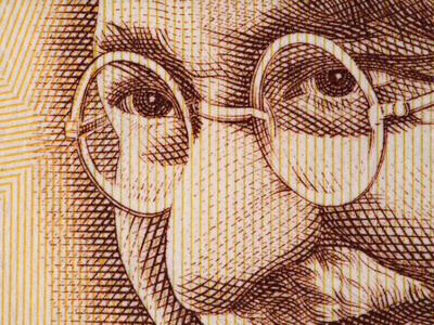 Mahatma Gandhi face on indian 500 rupee banknote extreme macro, India money closeup